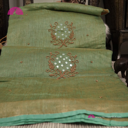 Organic Tissue Linen Saree in Pastel Green with Mirror Work and Hand Embroidery